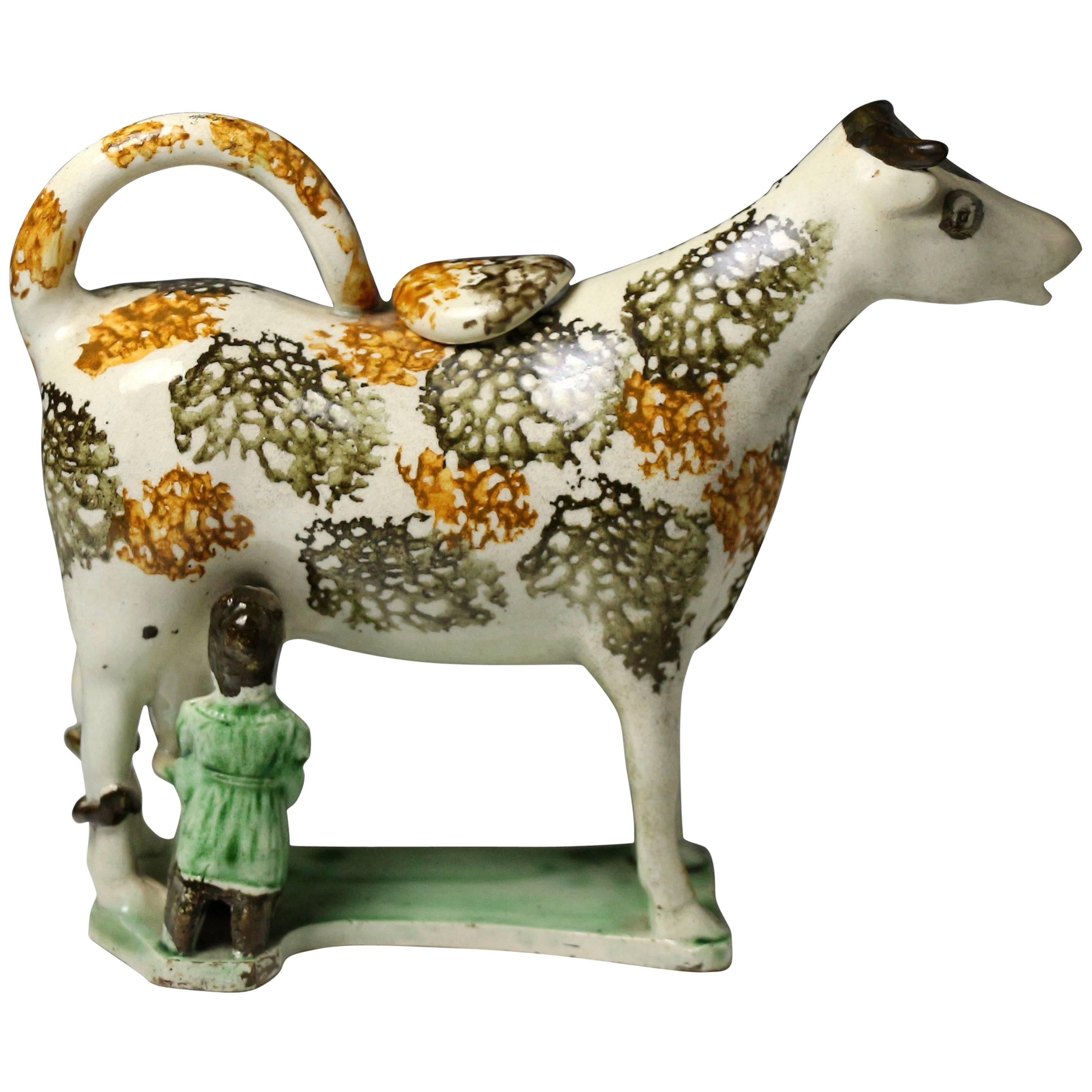 Antique Pearlware Pottery Figure of a Cow Creamer with Hobbled Legs