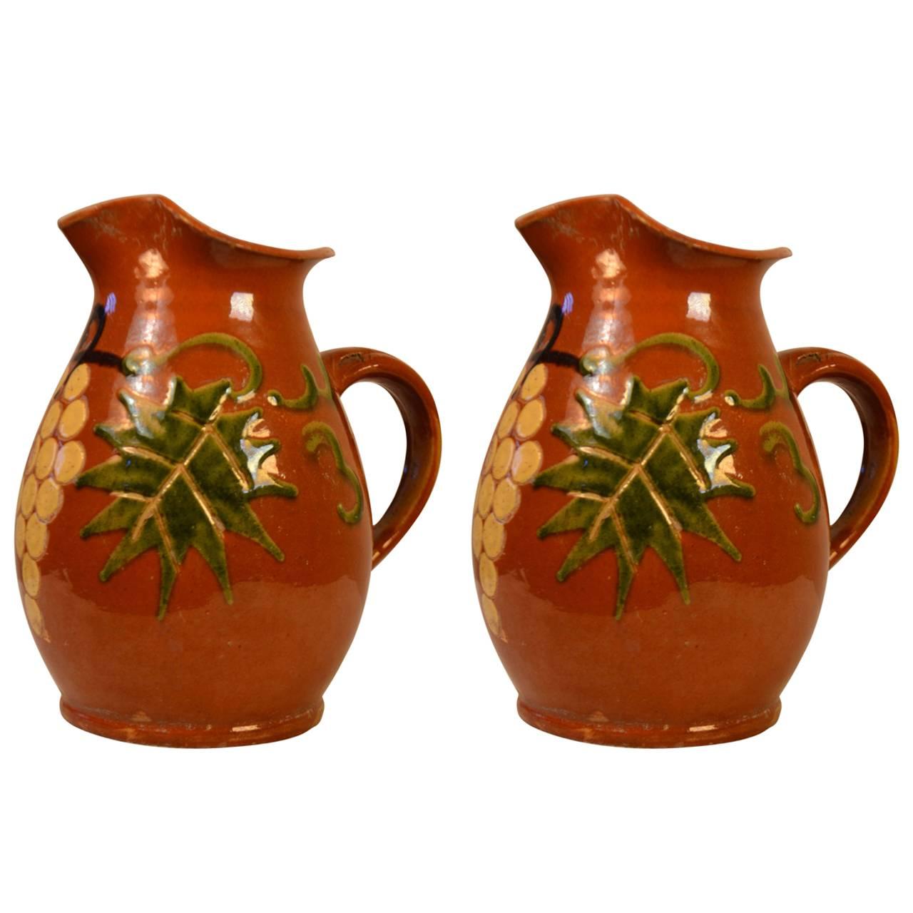 Turn of the Century Pair of Earthenware Pitchers 'Grapes'
