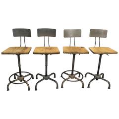 Set of Four Adjusto Equipment Industrial Stools, circa 1940