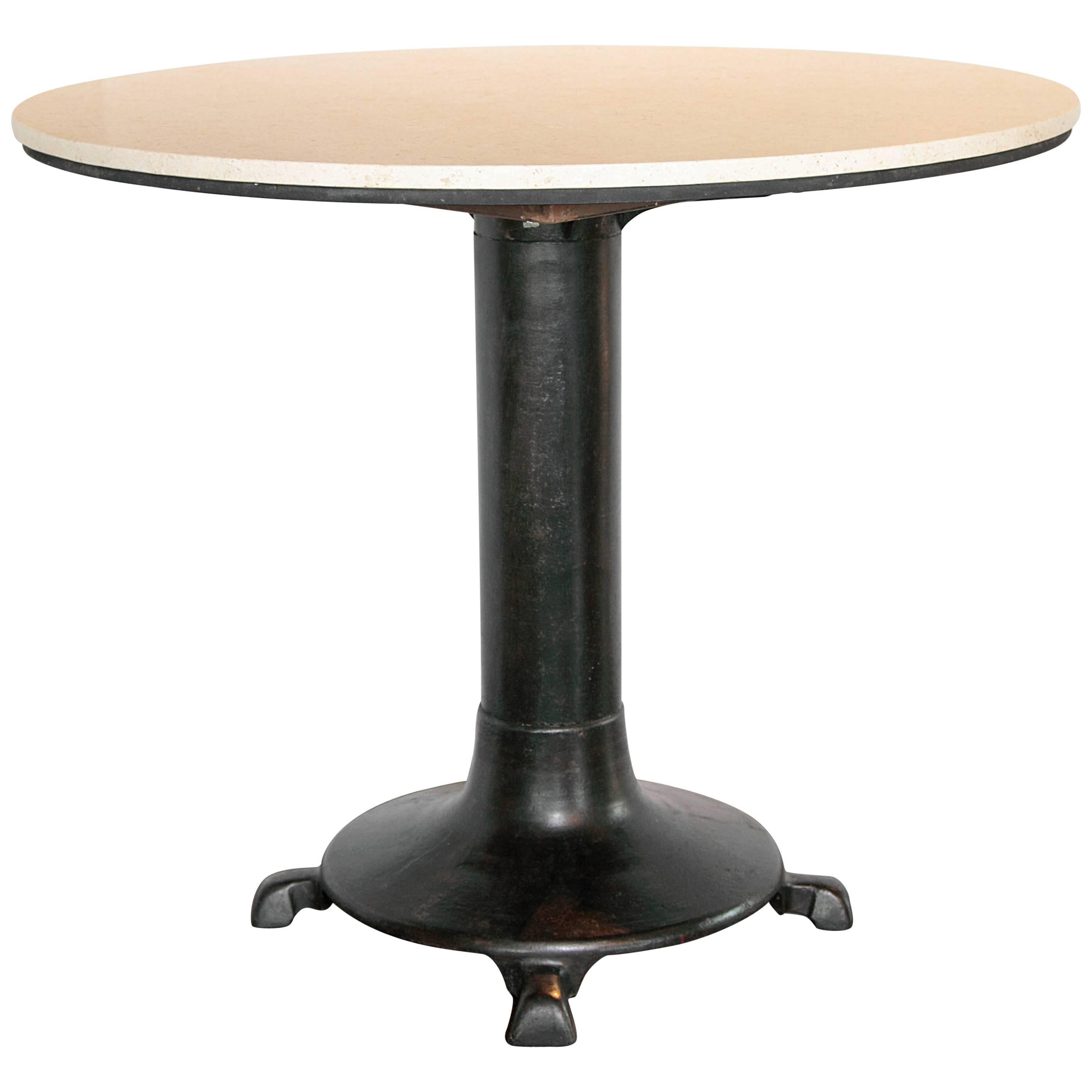 Antique French iron shop table with limestone top
Paris, France. 

 