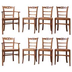 Set of Eight French Provincial Carved Rush Seat Dining Chairs