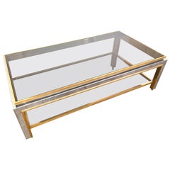 A Jean Charles 1970s polished chrome and brass Coffee Table with smoked glass