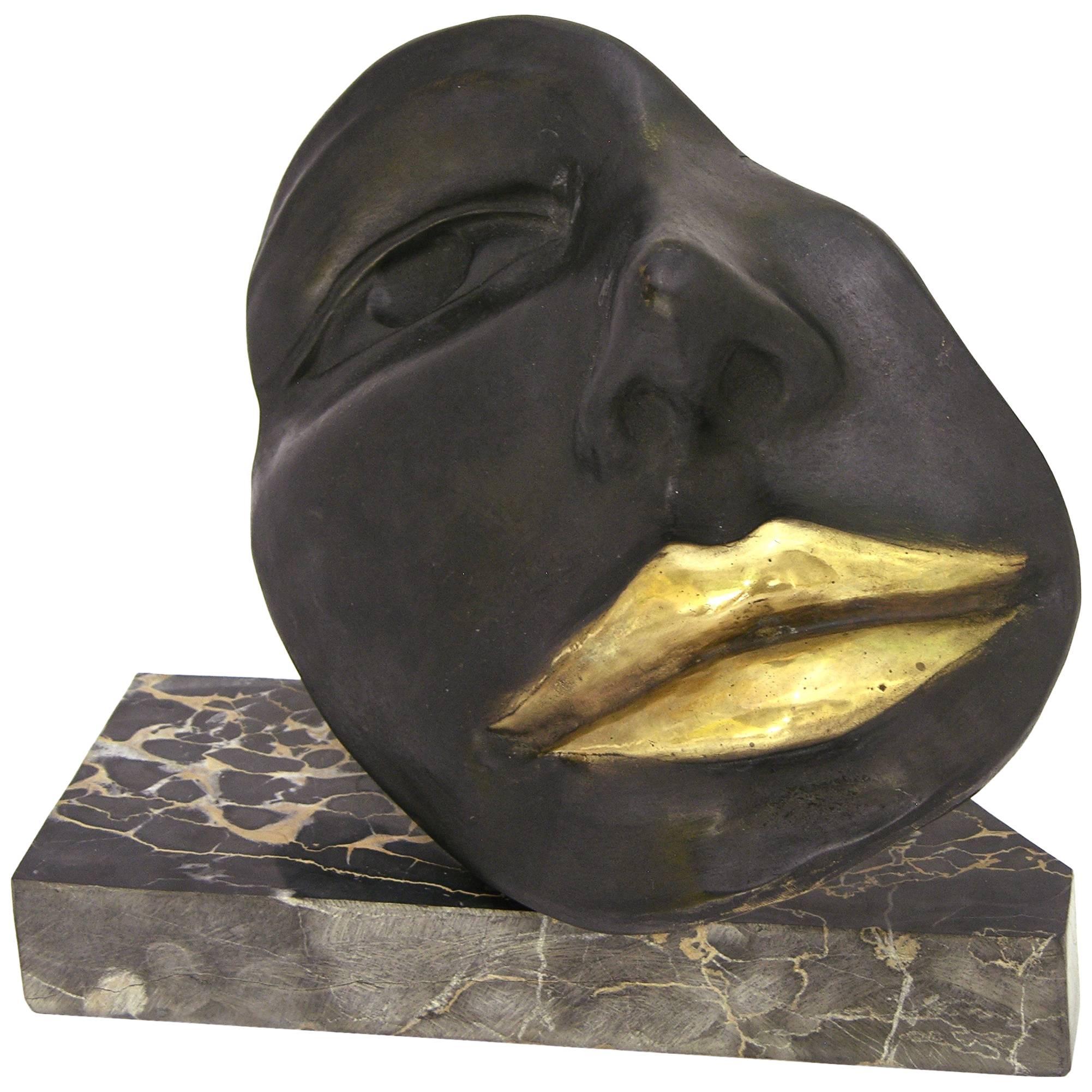Italian Black Bronze Sculpture of a Partial Face with Gold Lips on Marble Base