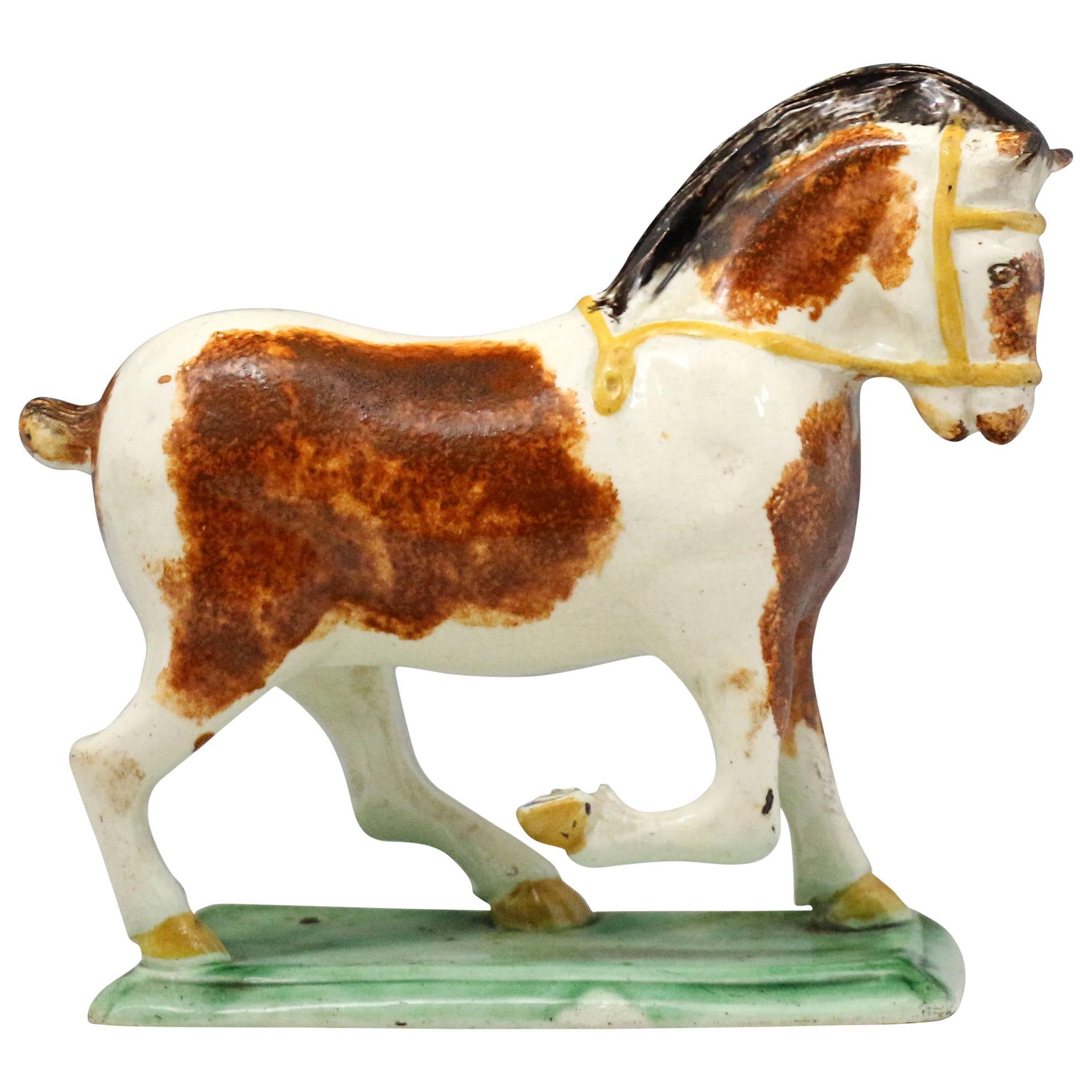 Staffordshire Pottery Figure of a Suffolk Punch Horse, England, circa 1790