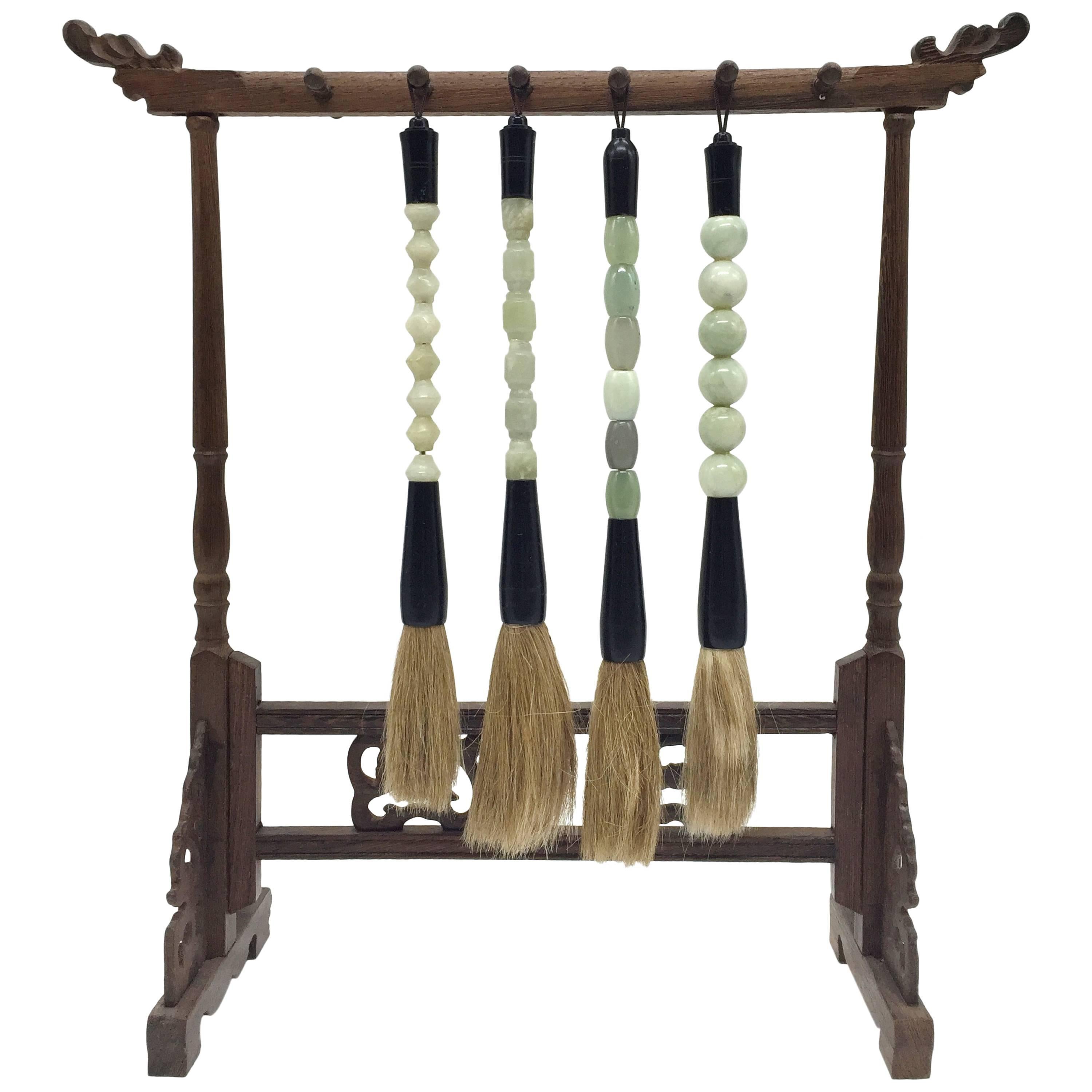 Set of Four Jade Calligraphy Brushes and Rosewood Brush Stand For Sale