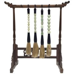 Set of Four Jade Calligraphy Brushes and Rosewood Brush Stand