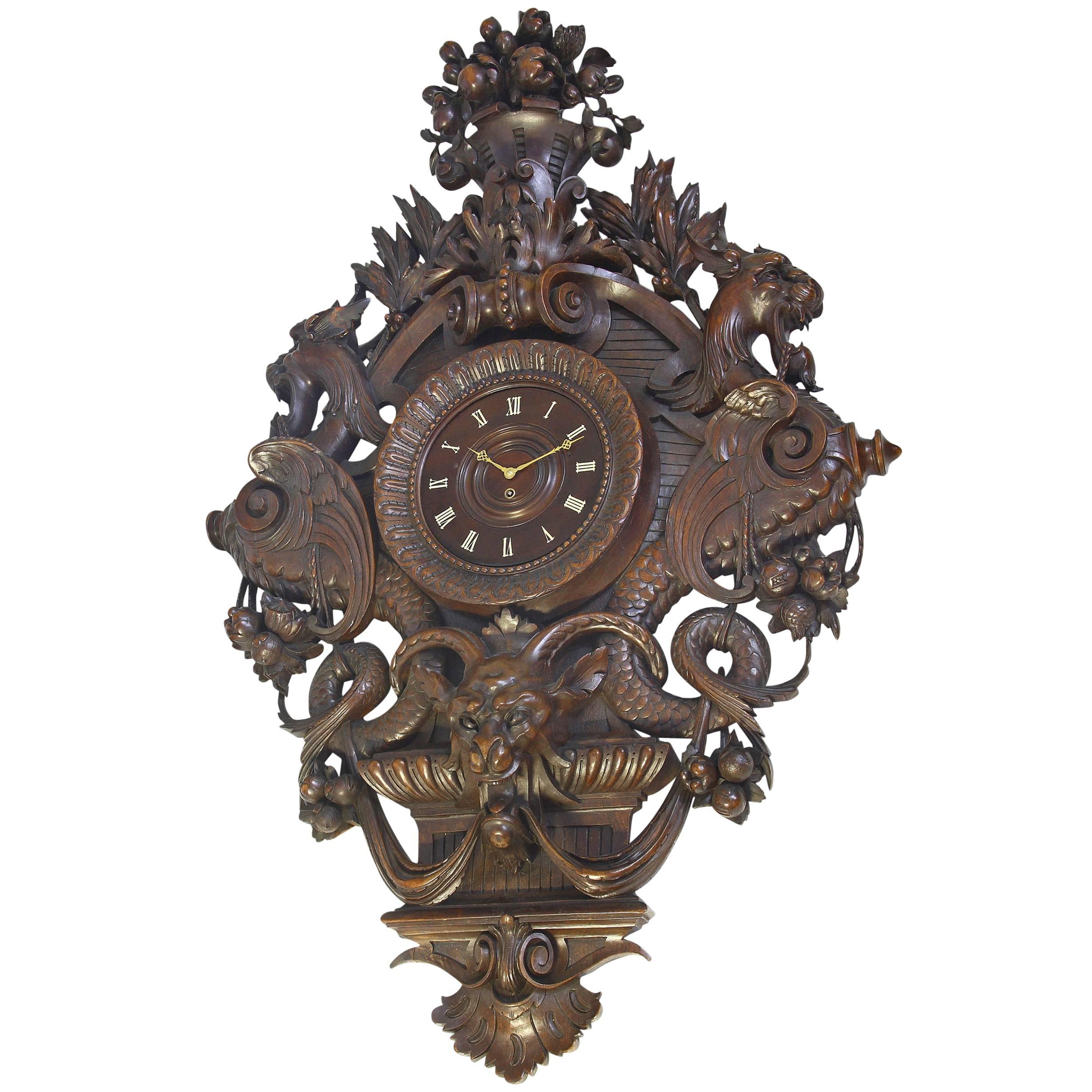 Very Large and Exceptional Carved Walnut Wall Clock with Imaginary Monsters For Sale