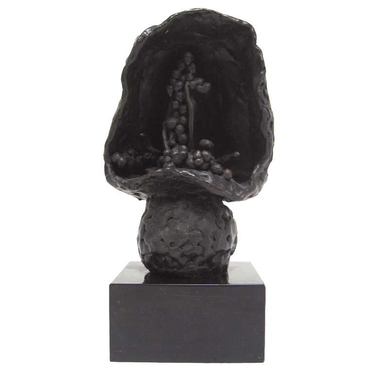 Abstract bronze sculpture by Roszi Tevan