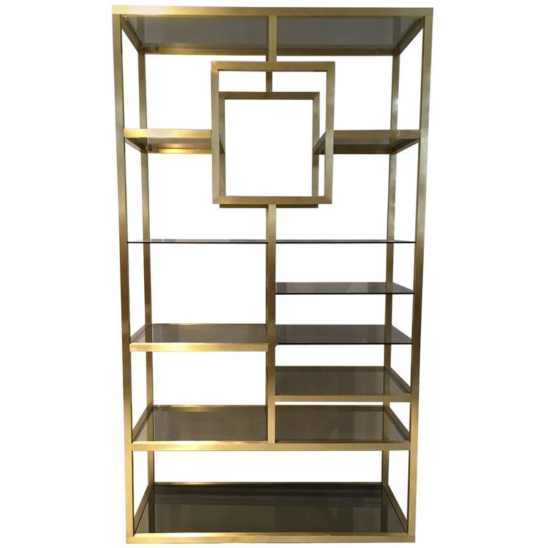 Mid Century Modern Polished Brass Shelving Attributed To Romeo Rega Mid Century Modern Polished Brass Shelving Attributed To Romeo Rega For At 1stdibs