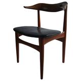 Dänischer moderner Sessel aus Nussbaumholz und Leder von Povl Dinesen