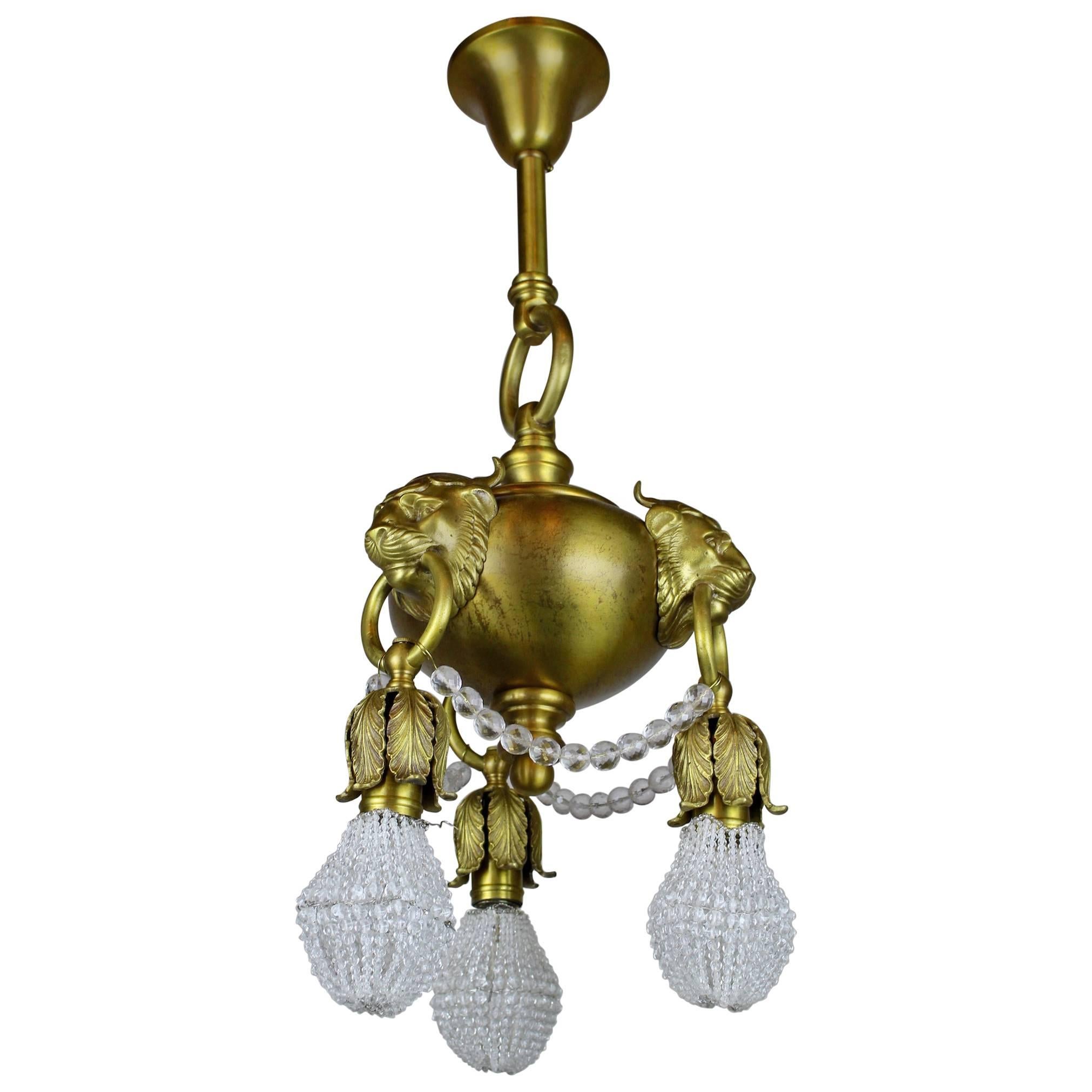 Neoclassical Revival "Lion Mask" Fixture with Crystal For Sale
