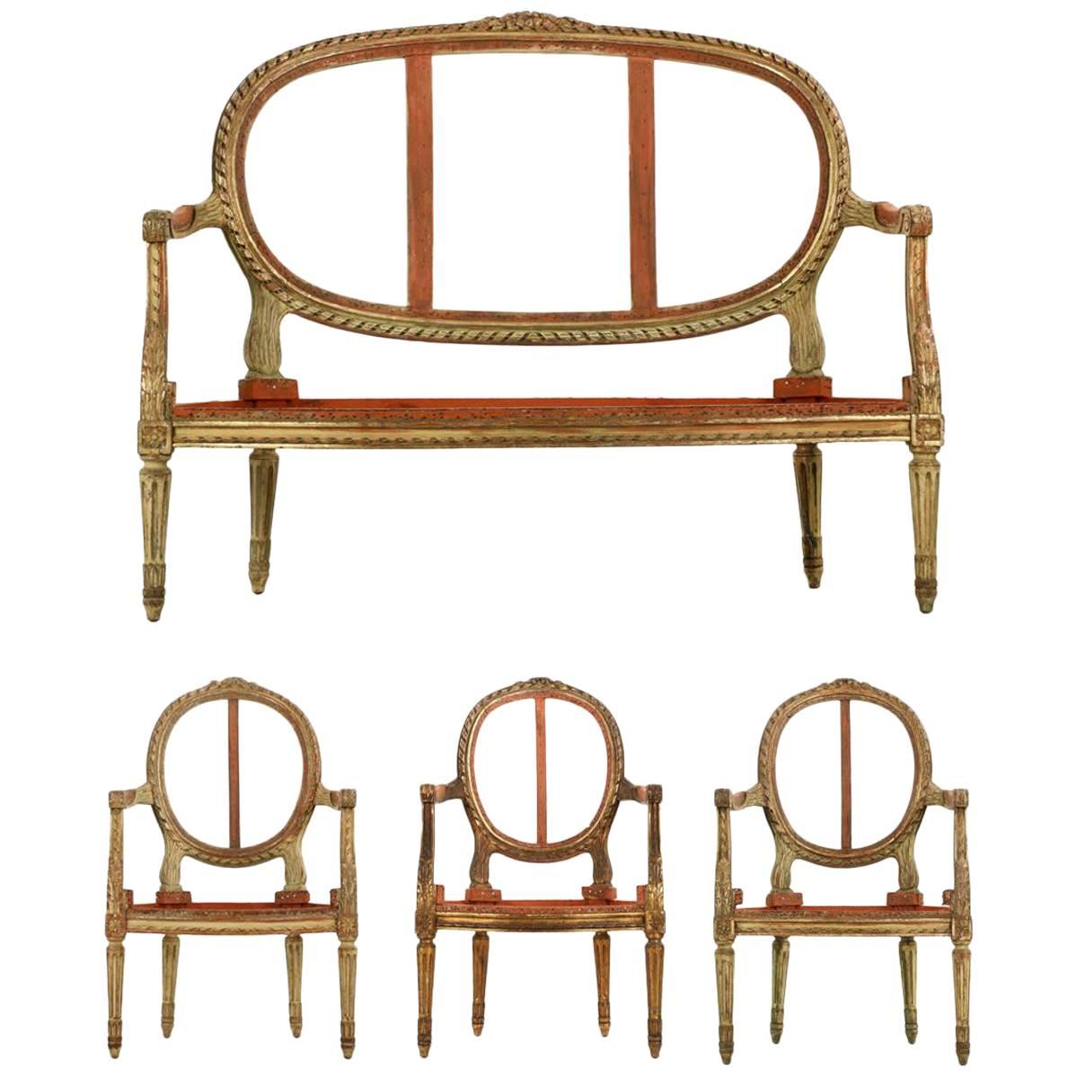 French Louis XVI Distressed Painted Salon Suite of Settee with Three Armchairs