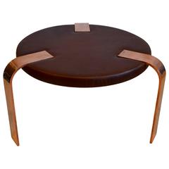 Round Art Deco Leather and Copper Ottoman or Side/Coffee Table by Donald Deskey