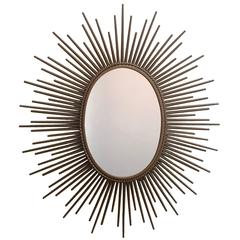 Gilt Sunburst Oval Mirror by Chaty in Vallauris, France, Signed 12