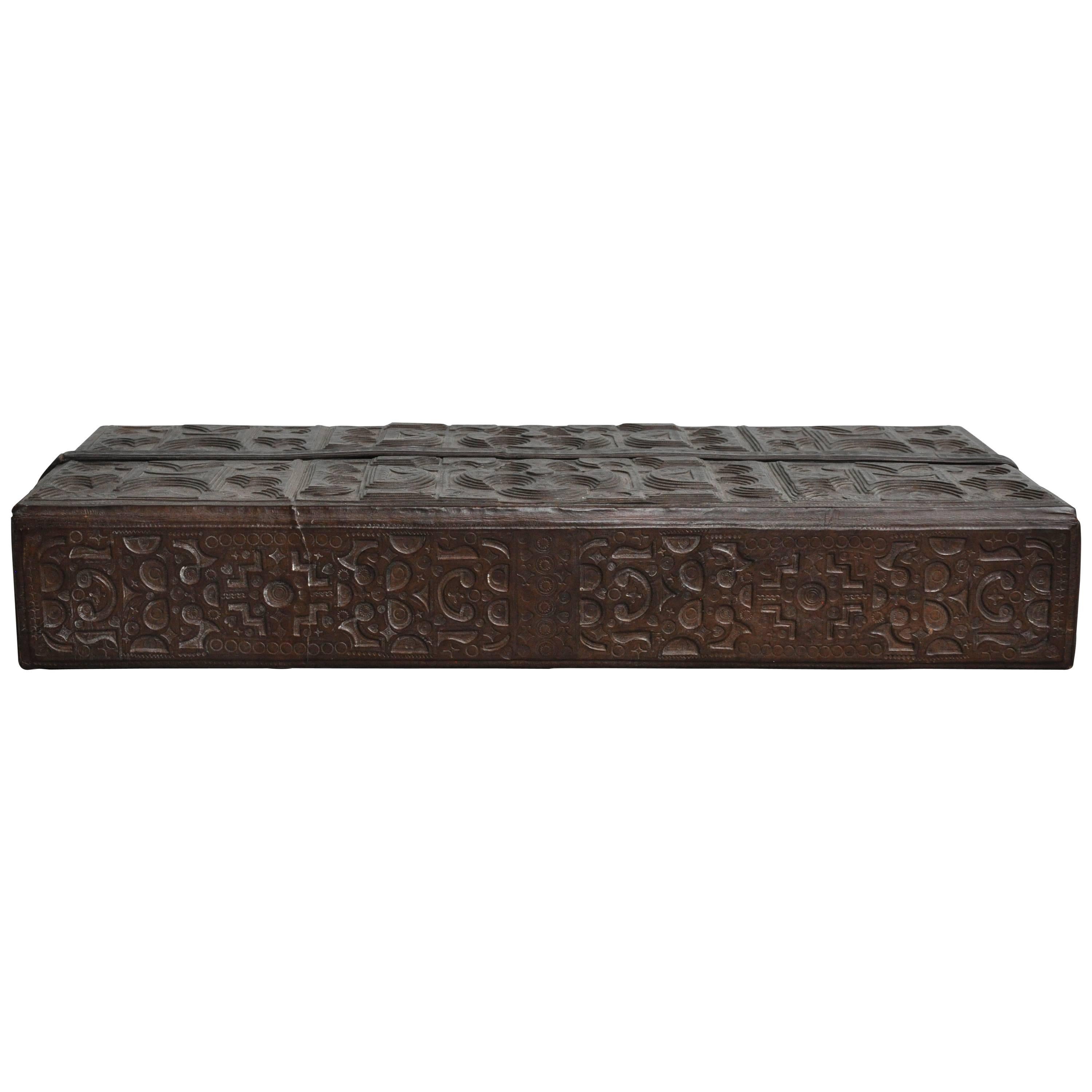 Early 20th Century Tooled Leather Box from Morocco
Leather box was found in France.
The Workmanship of this piece is second to none.
Beautifully tooled and designed with classic African designs.
Opens to wooden interior with various compartments and