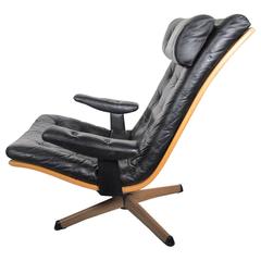 Mid-Century Modern Black Leather Button Tufted Swivel Armchair