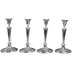 Set of Four George III Sterling Candlesticks