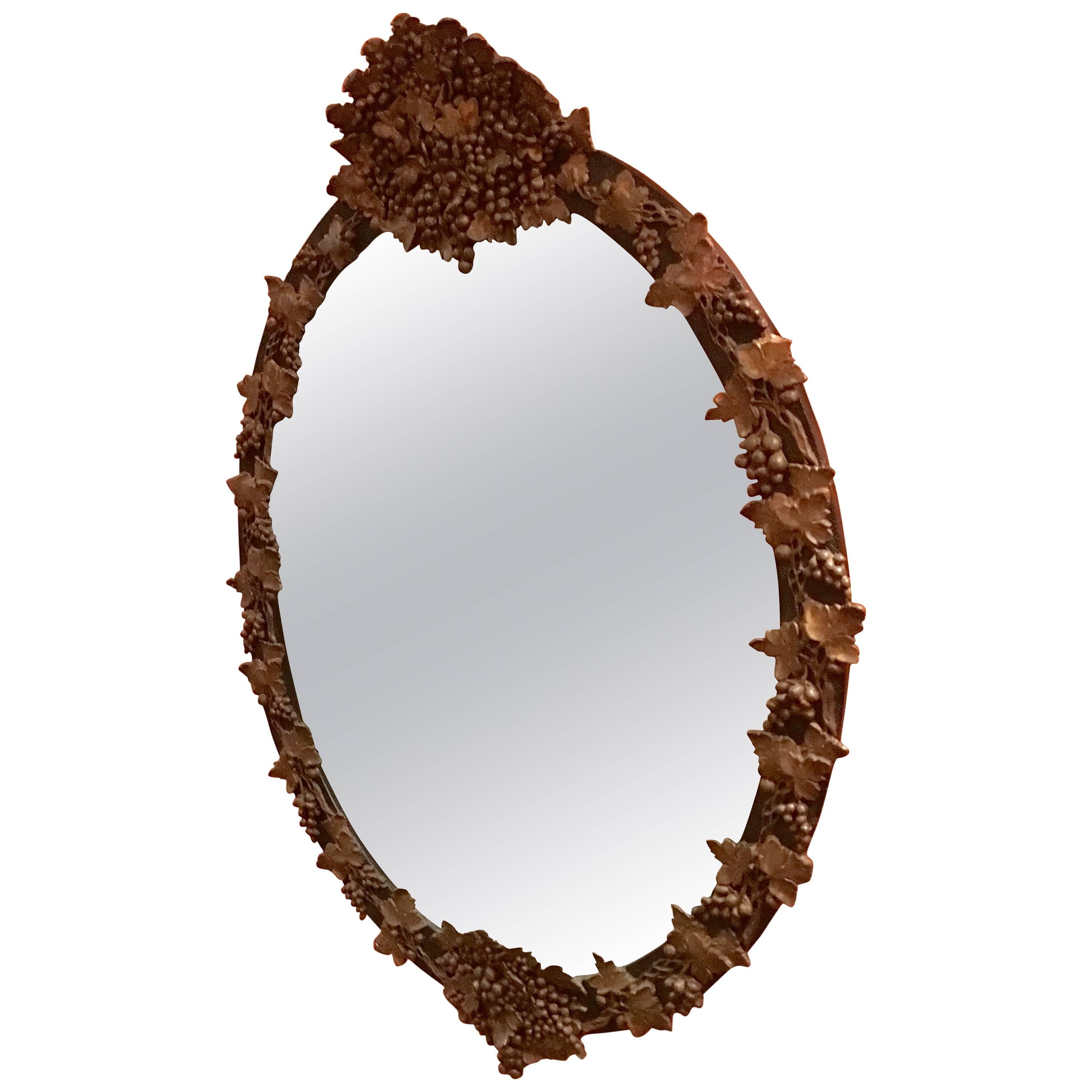 Modernist Oval Gold Leaf Mirror at 1stDibs