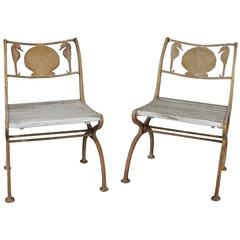 Pair of rare 1920s Cast Iron Seashell and Seahorse Chairs