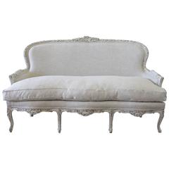Antique French Roses Carved Sofa Upholstered in Belgian Linen