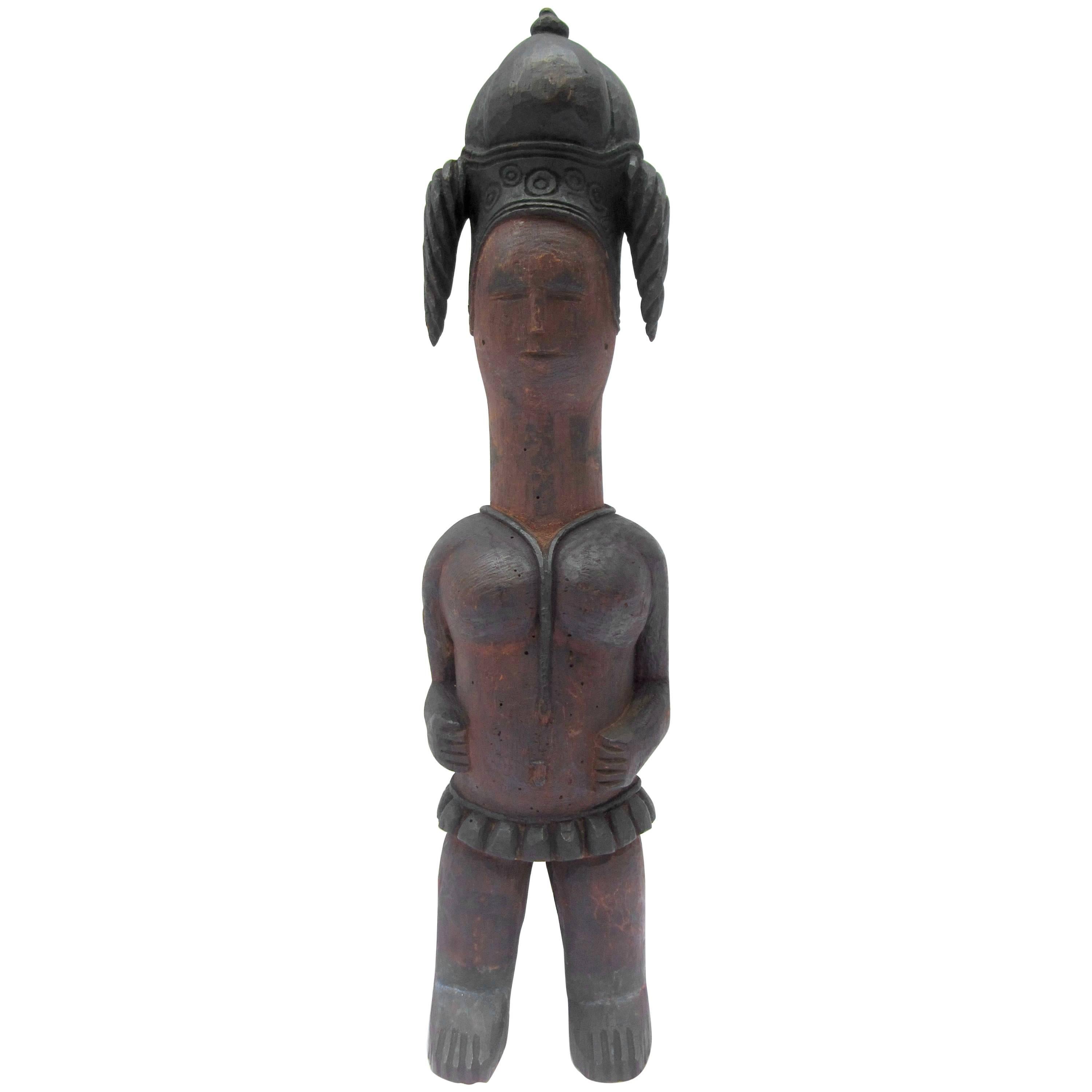 Statue tribale en bois sculpté
