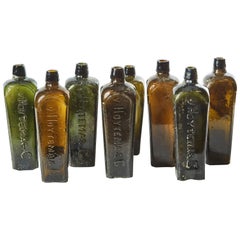 Set of 8 Multi-Color Gin Glass Bottles from Mid-Century Germany