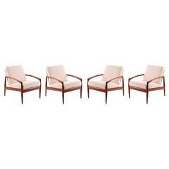 Four Kai Kristiansen Teak and Upholstered Lounge Chairs