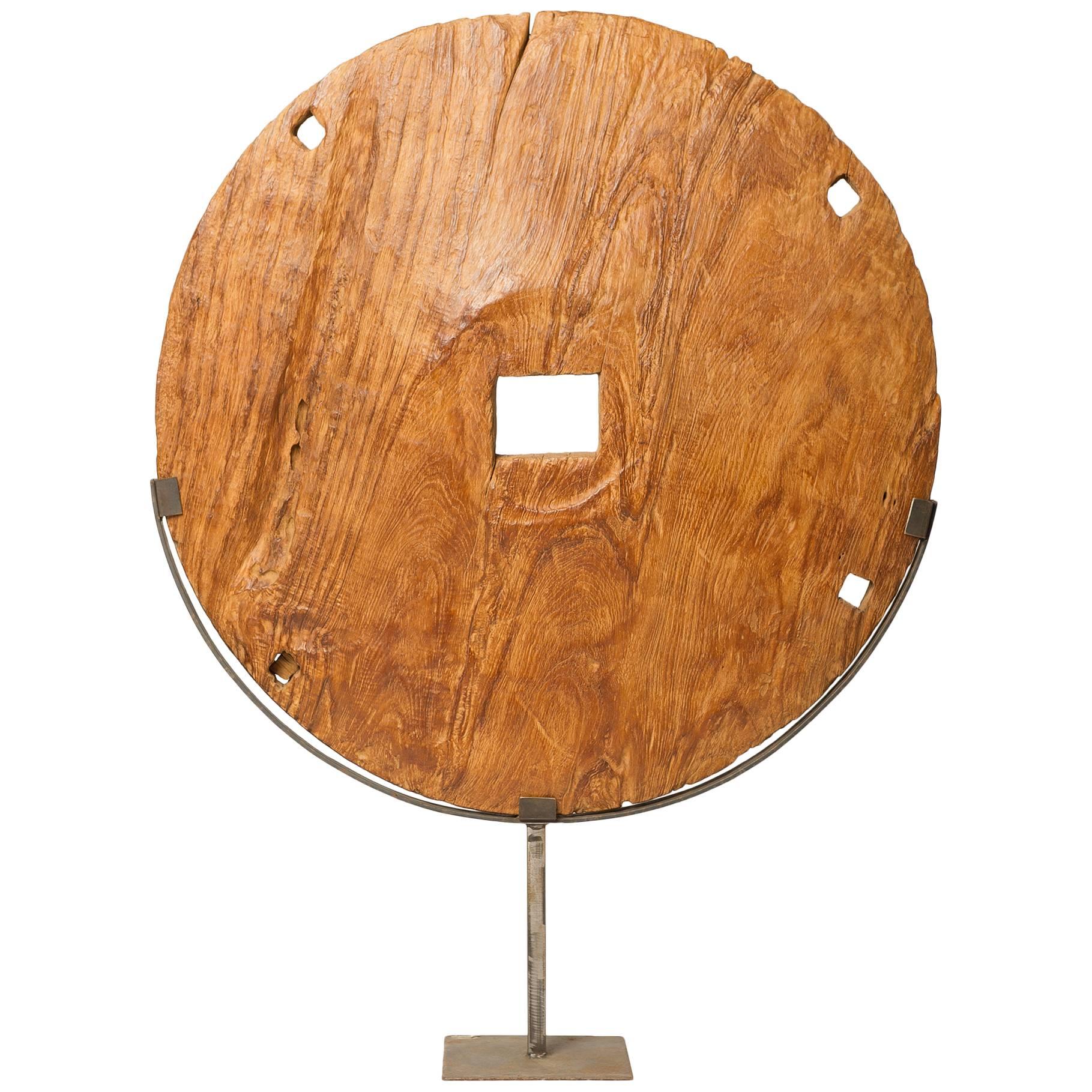  Modern Sculpture with an Arcaic Wooden Wheel For Sale