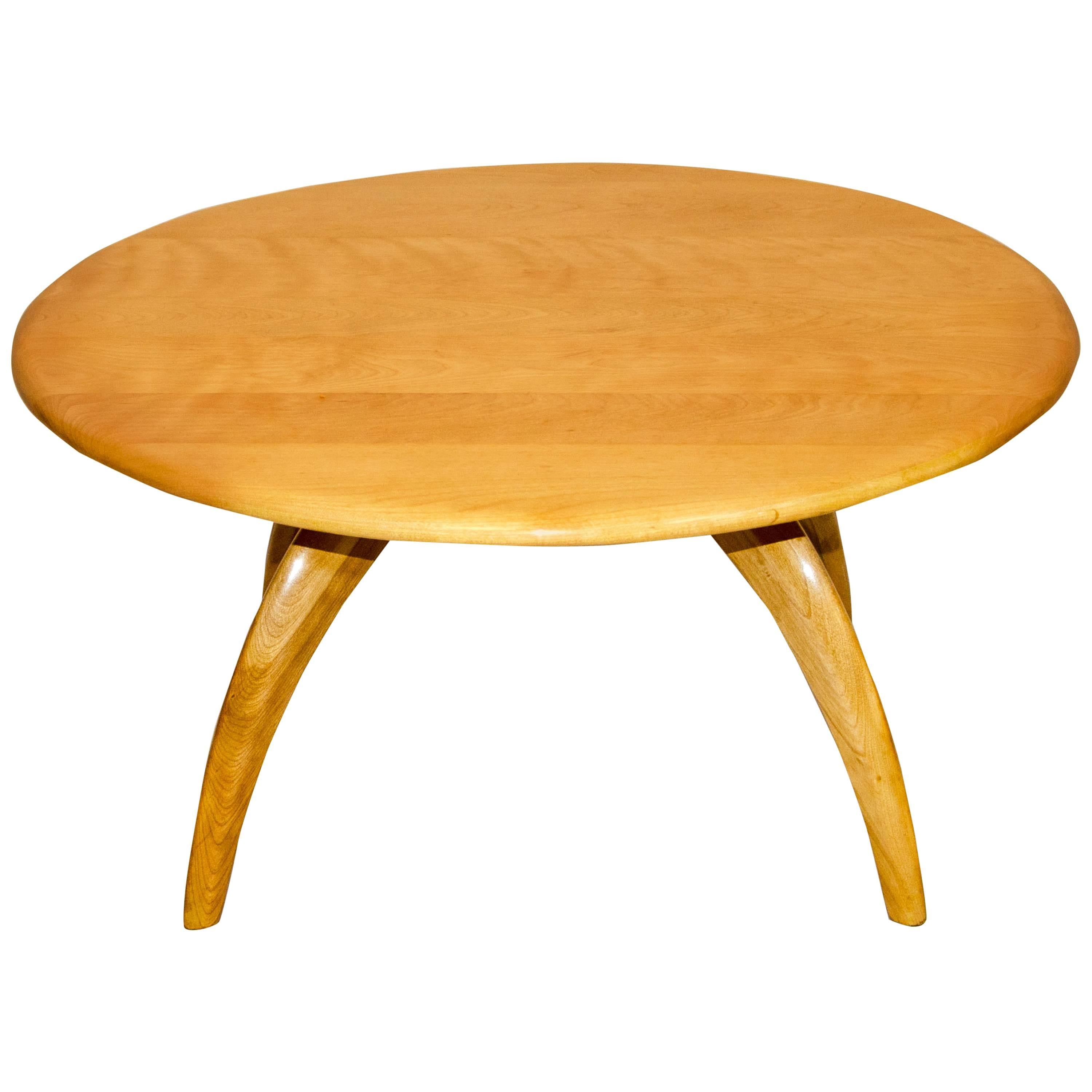 This is a very popular cocktail table that the Heywood Wakefield Co. manufactured for quite a few years. It has the signature 