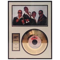 80
 Kool 
The Gang Autographed Photograph 
24-Karat Gold "Celebration" Record