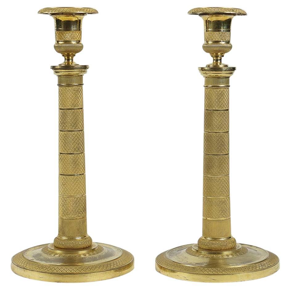 Early 19th Century Pair of French Empire Period Ormolu Candlesticks, circa 1810