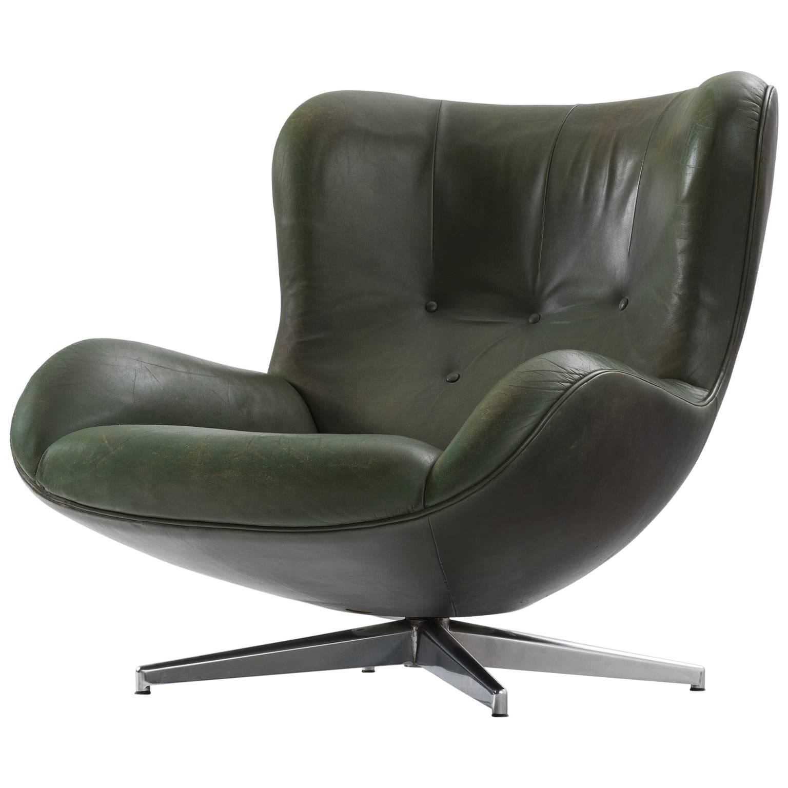 Illum Wikkelsø Green Leather Swivel Lounge Chair