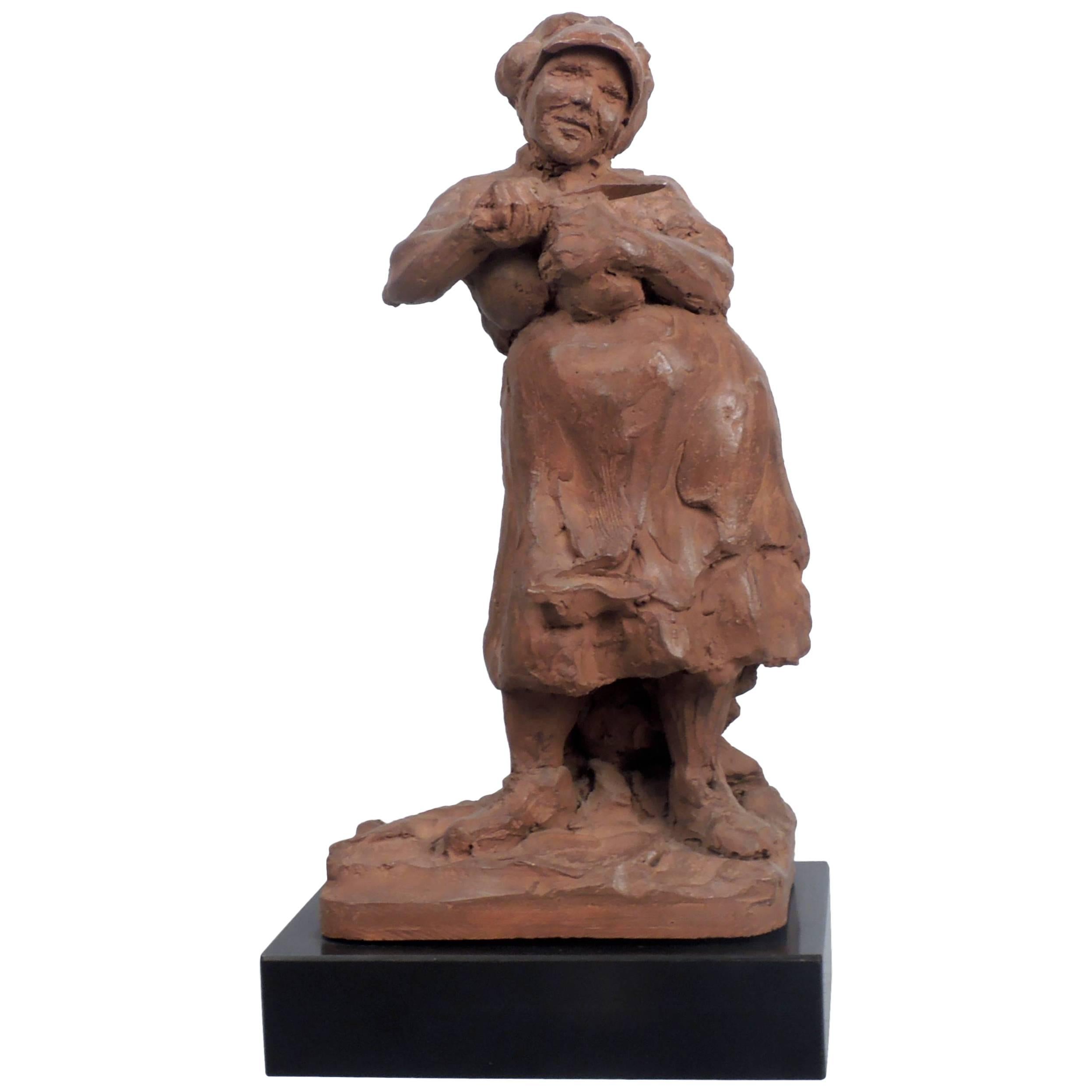 "Woman Slicing Bread" Sculpture by Ramon Lago For Sale