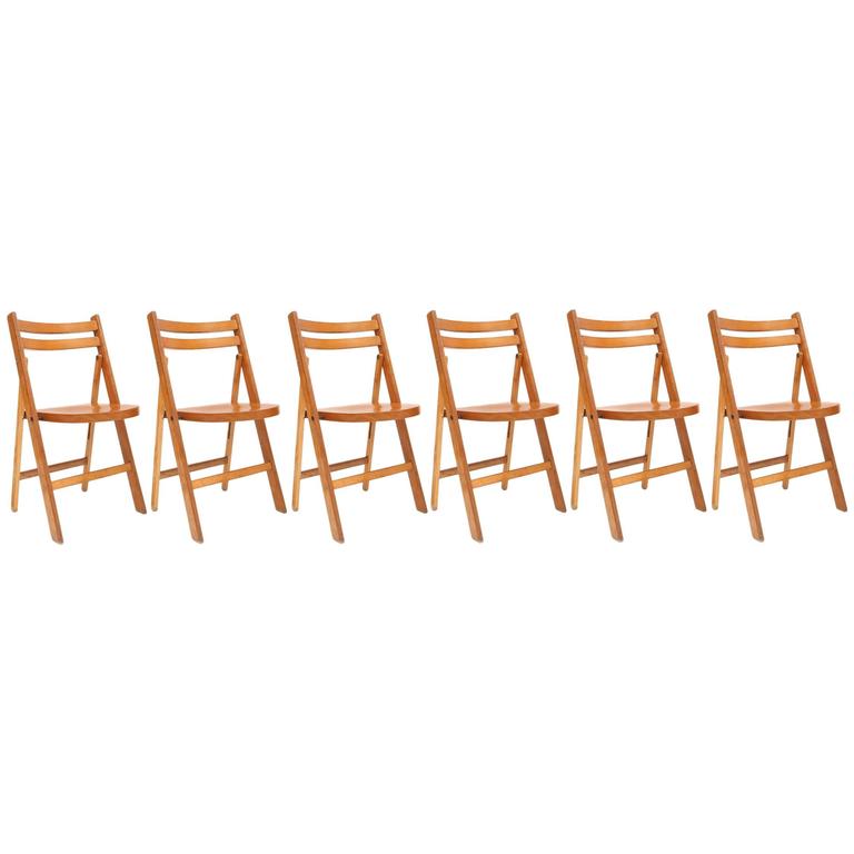 Midcentury modern vintage wooden stackable folding chairs For Sale at