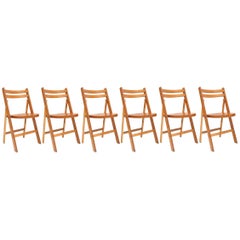 Mid-century modern vintage wooden stackable folding chairs
