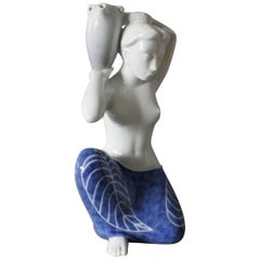 Royal Copenhagen Large Porcelain Figurine, Seminude Woman Carrying a Water Jug