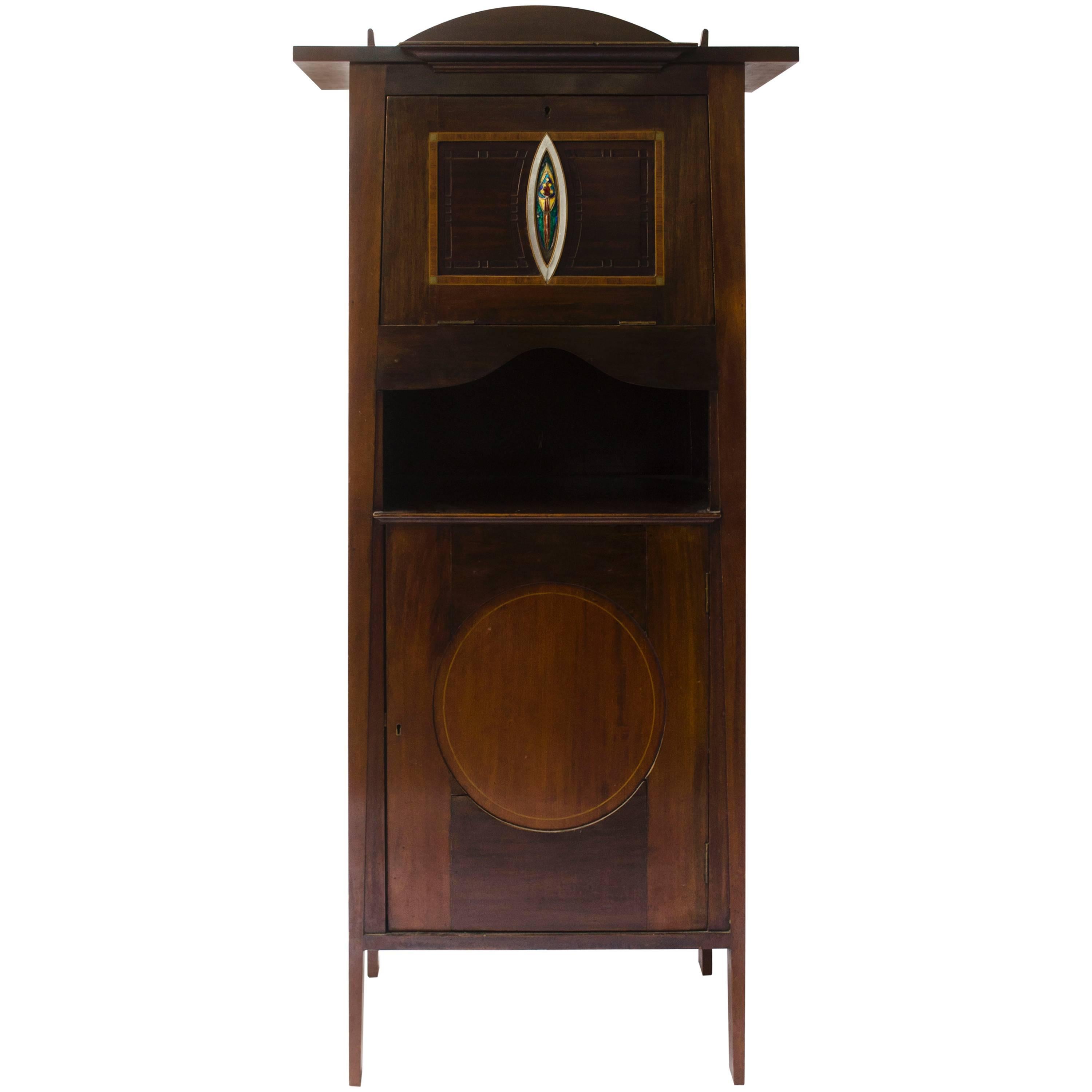 G M Ellwood. J S Henry & J M King attr, An Arts & Crafts Mahogany Music Cabinet. For Sale