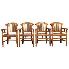 Set of Four Solid Hand-Carved Teak Armchairs