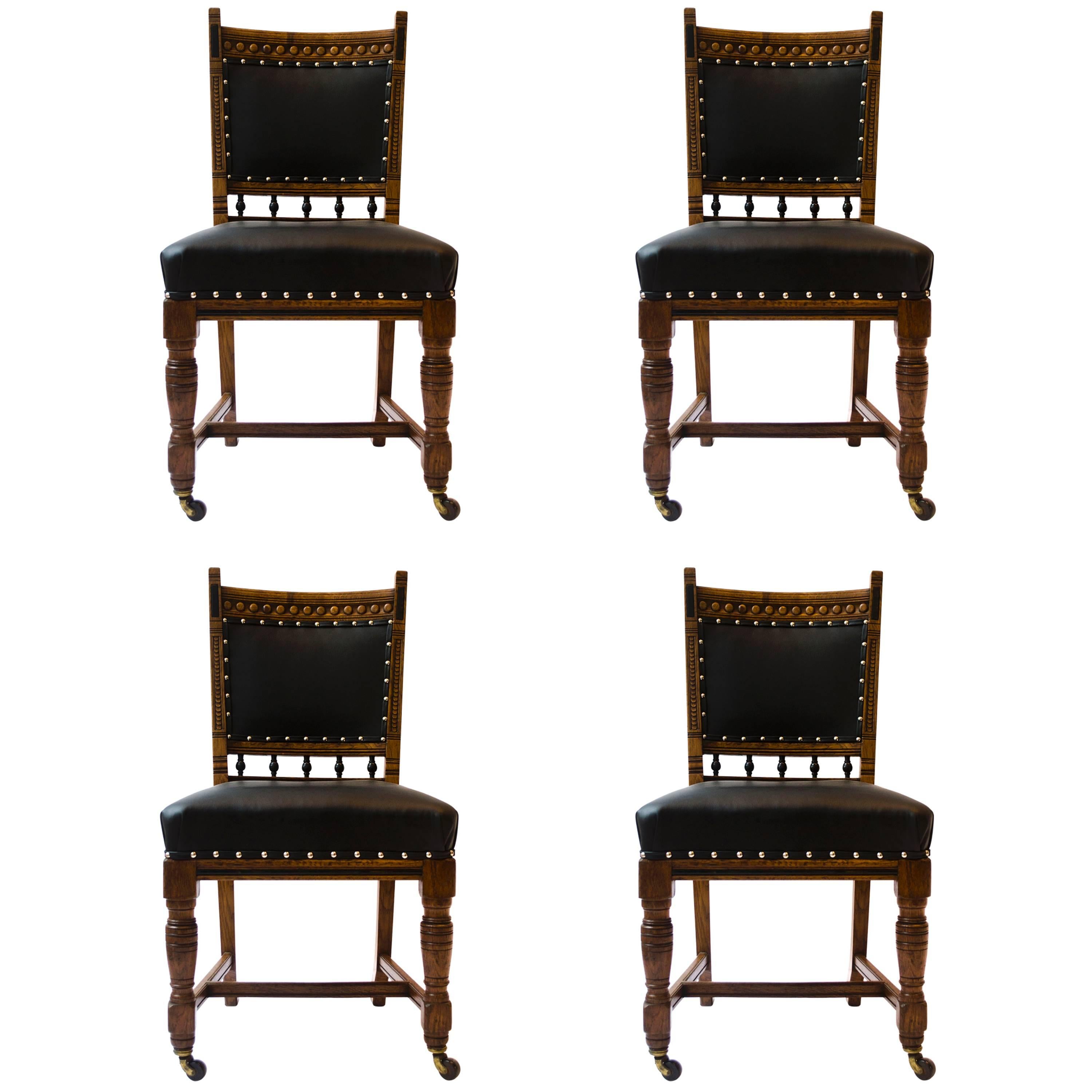 Lambs of Manchester A Set of Four Aesthetic Movement Oak & Leather Dining Chairs For Sale