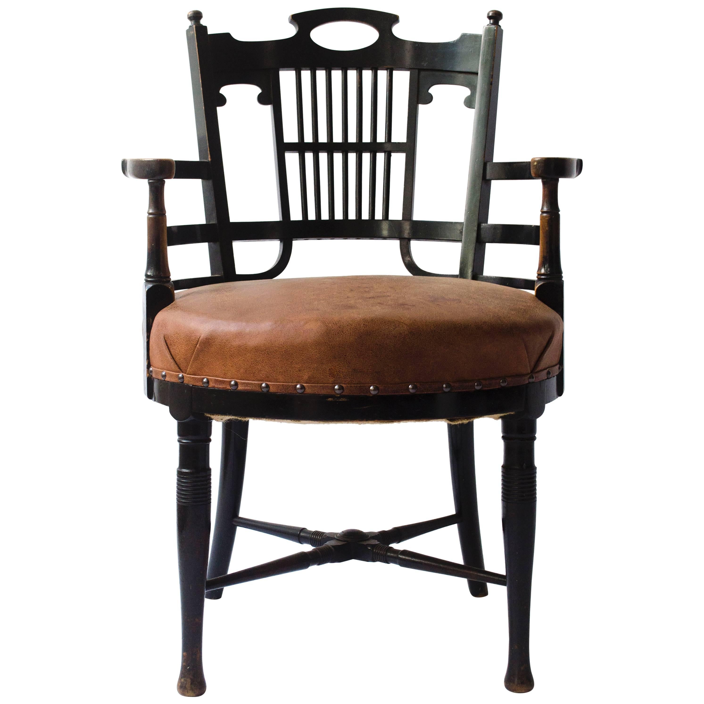 E W Godwin style of, An Anglo-Japanese Old English or Jacobean Ebonized Armchair For Sale