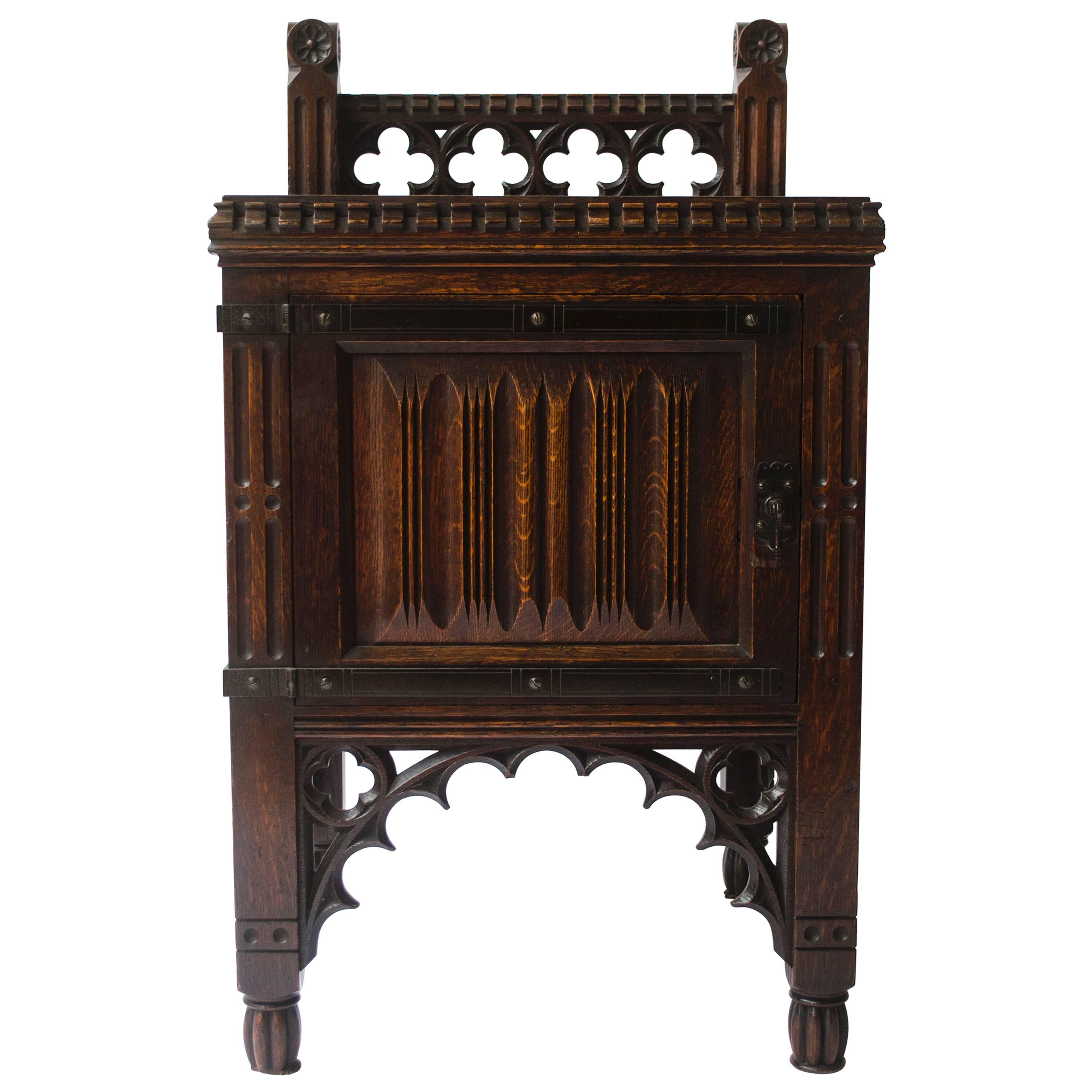 Bruce Talbert Gothic Revival Oak Night Table With Carved Linen Fold Carvings.