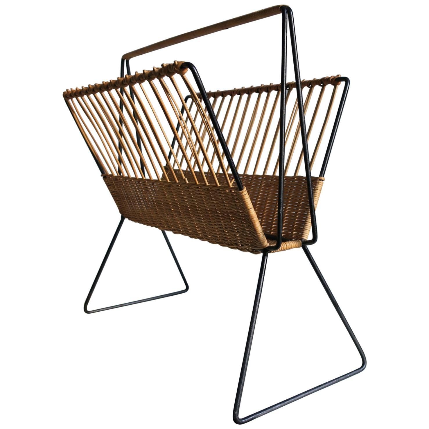 Mid-Century Rattan and Black Painted Metal Magazine Rack For Sale