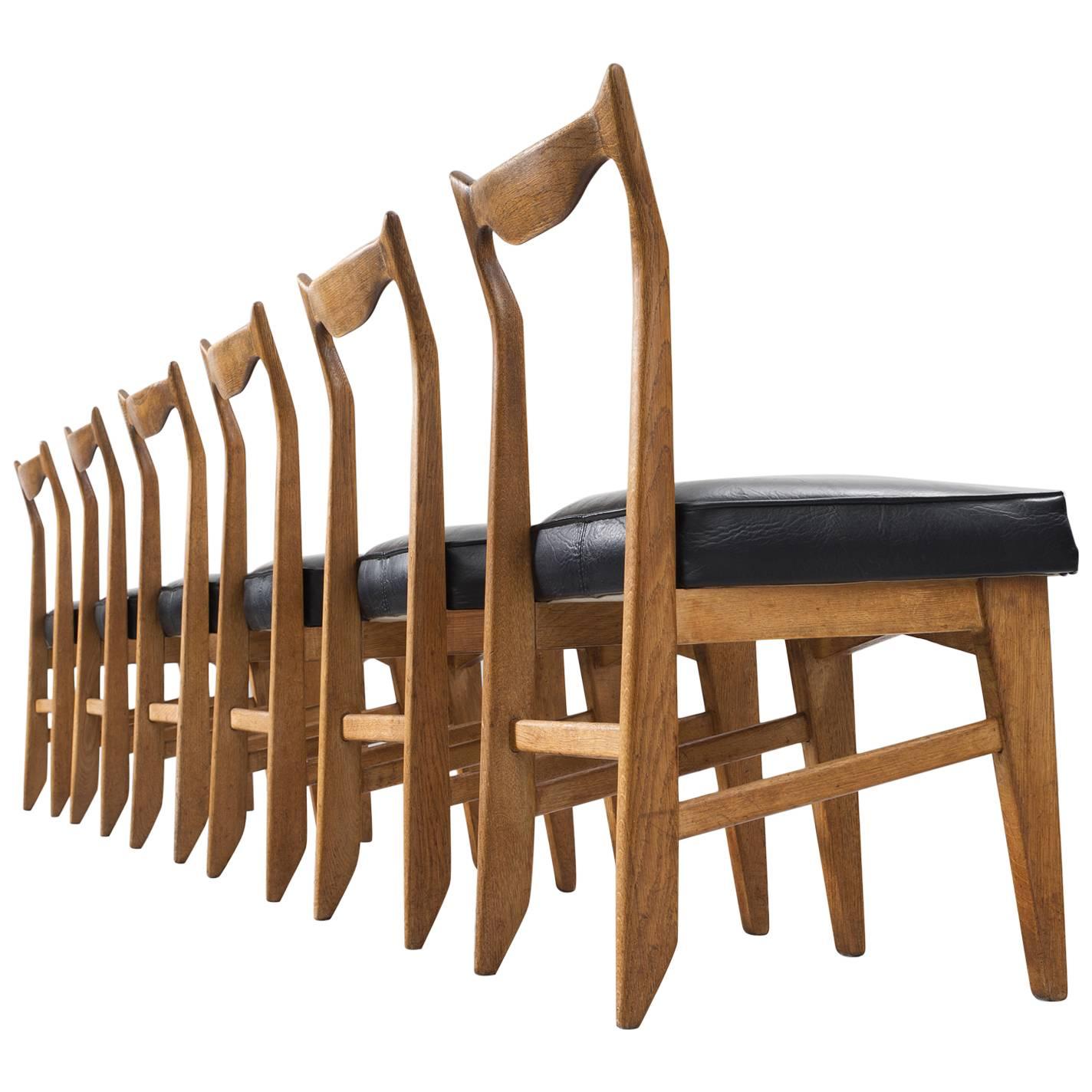 Guillerme and Chambron Set of Six Oak Dining Chairs