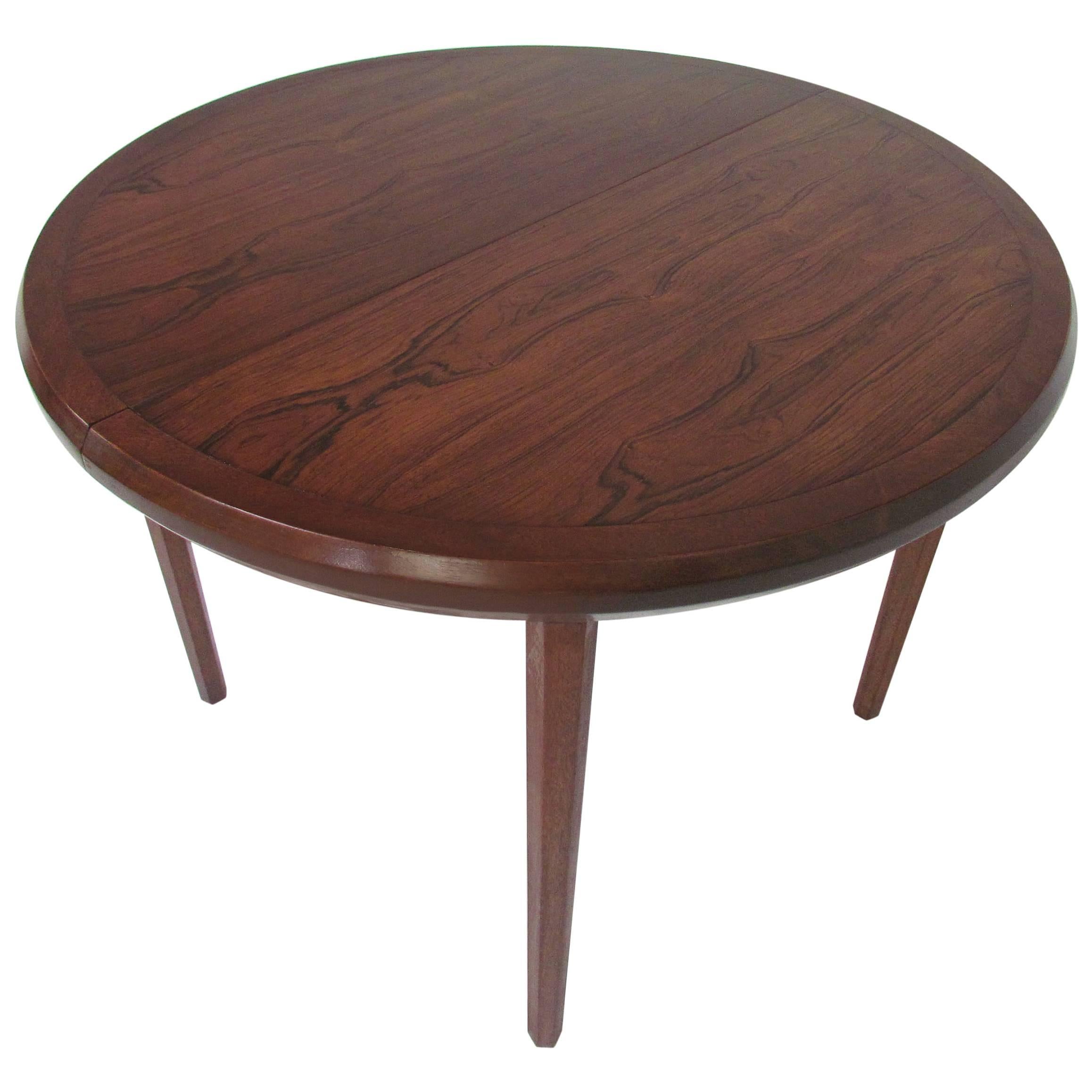 Mid-Century Circular Rosewood Dining Table with Three Leaves by John Stuart