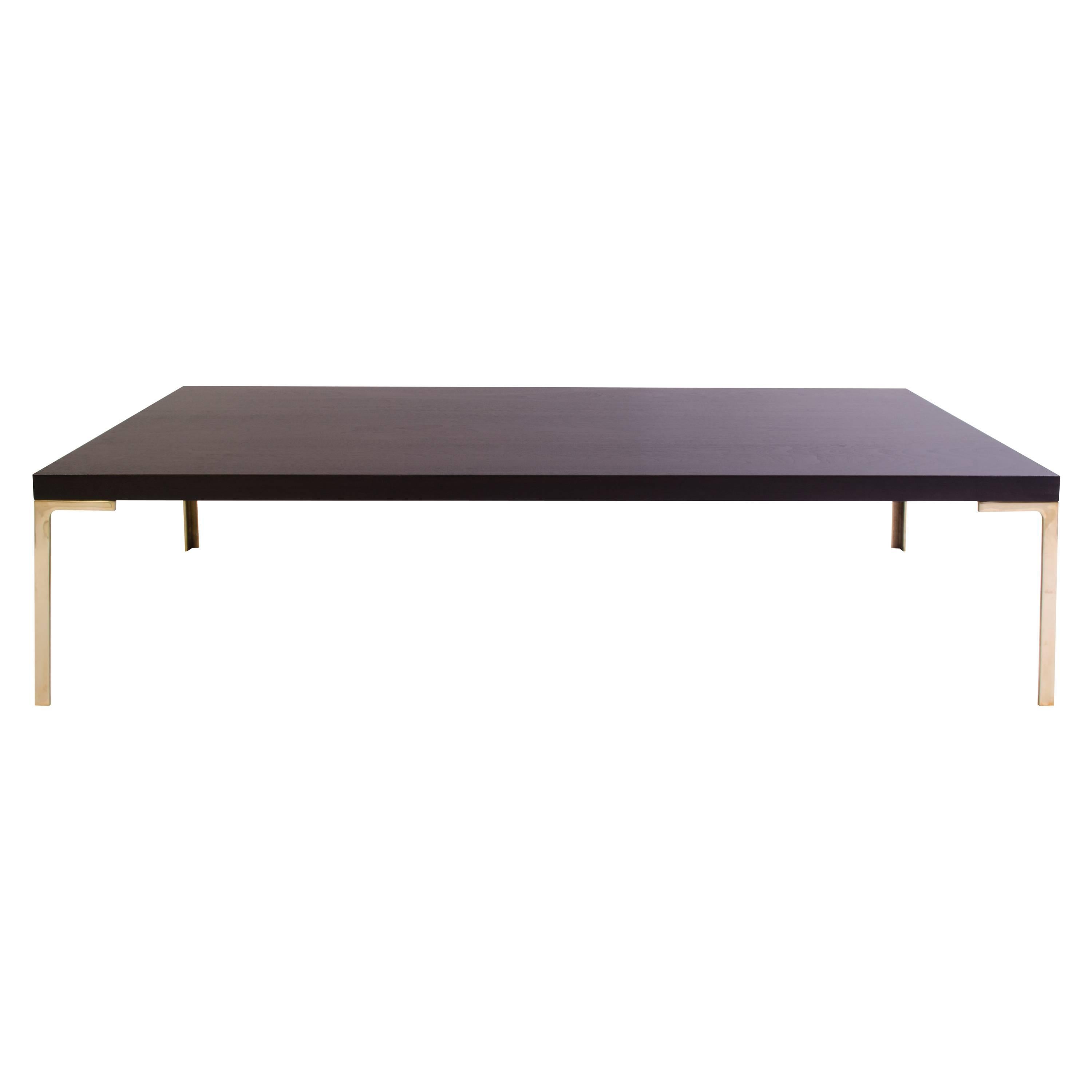 Astor Cocktail Table in Ebonized Walnut with Brass Legs by Montage, 60" x 24"