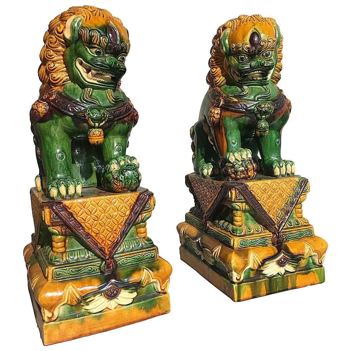 Pair of Chinese Sancai Glazed Foo Lions For Sale at 1stdibs