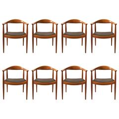 Hans Wegner, Set of Eight Round Back Dining Chairs in Mahogany and Black Leather