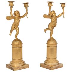 Pair of Two-Armed Empire Ormolu Candlestick with Cupids, circa 1820