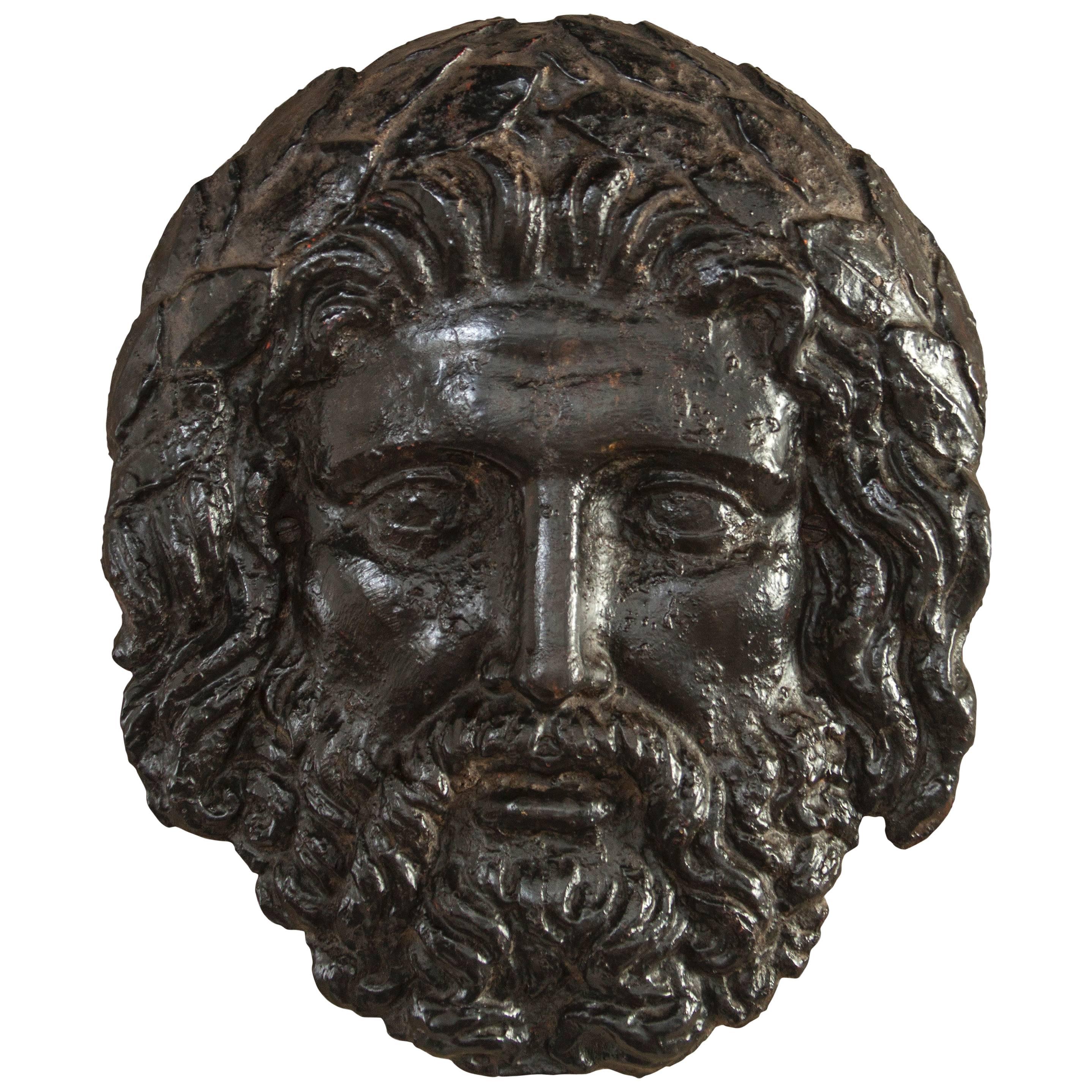 Continental Black Patinated Iron Bas-Relief Mask of Zeus For Sale