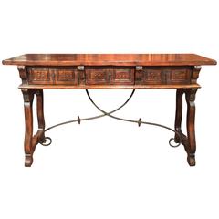 Antique Early 20th Century Spanish Carved Walnut Console with Drawers and Iron Stretcher